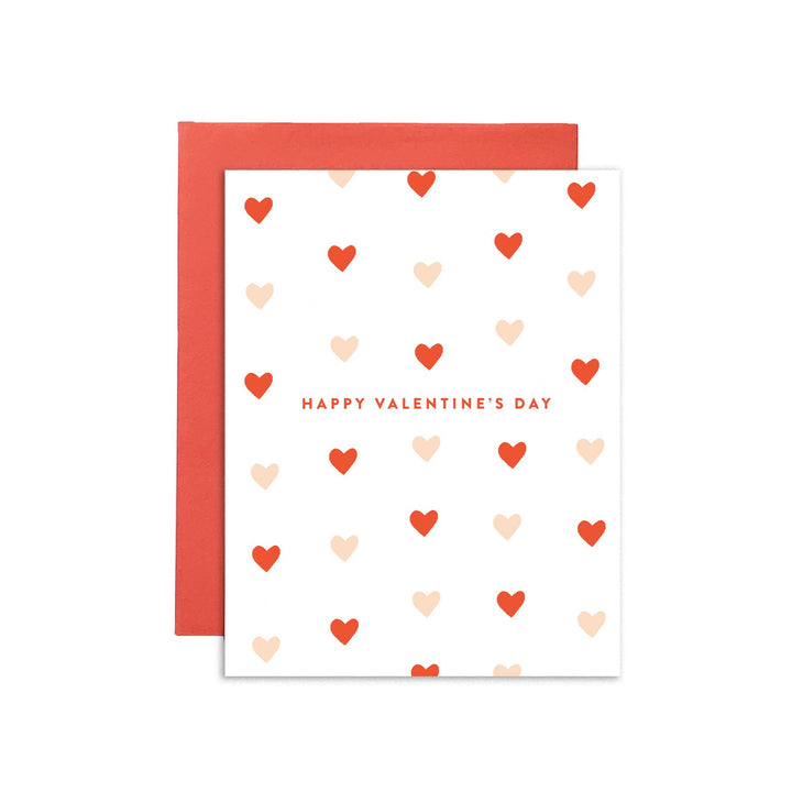 Valentine's Day card with red and pink hearts on a white background